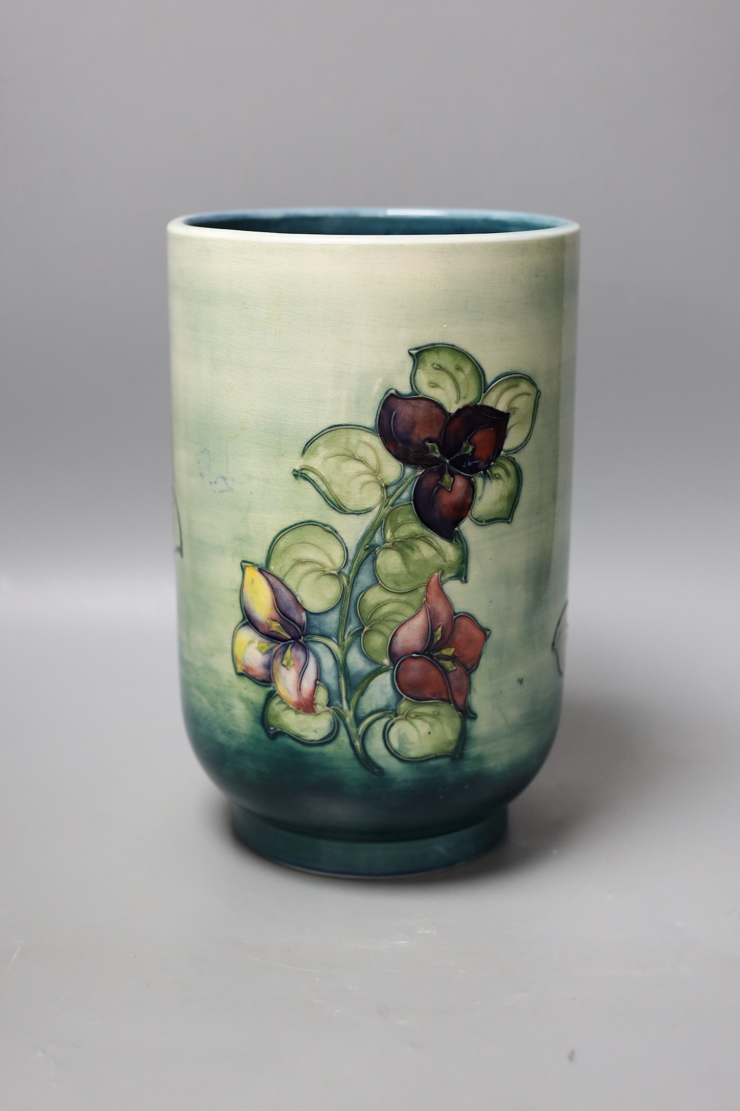 A large Moorcroft cylindrical vase, 25cm